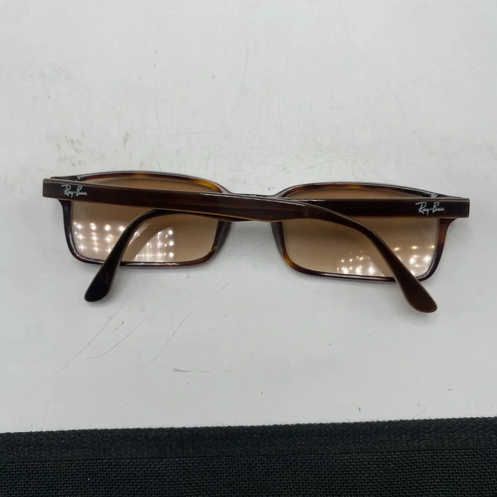 Ray-Ban dollars eyeglasses face